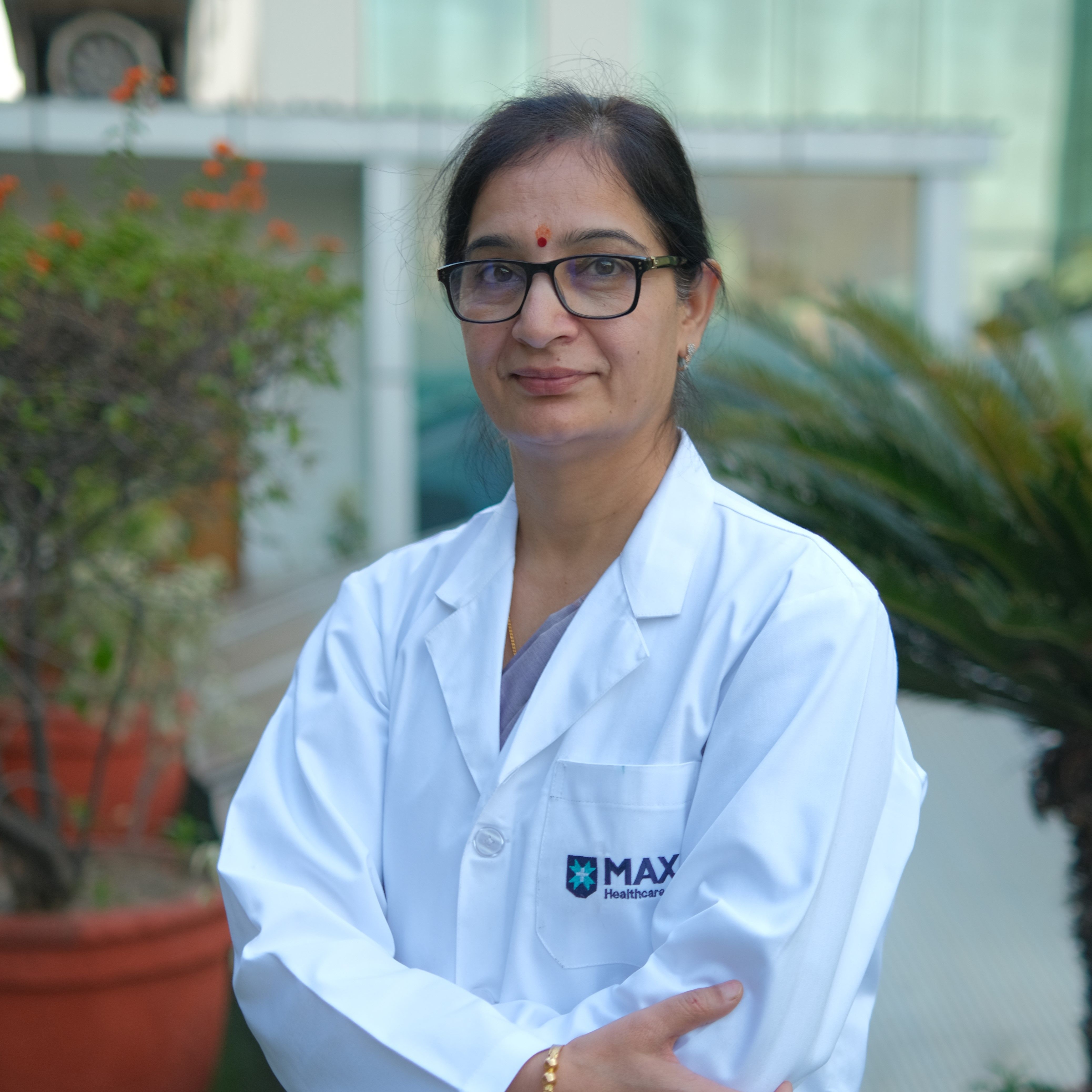 Dr Munesh Tomar